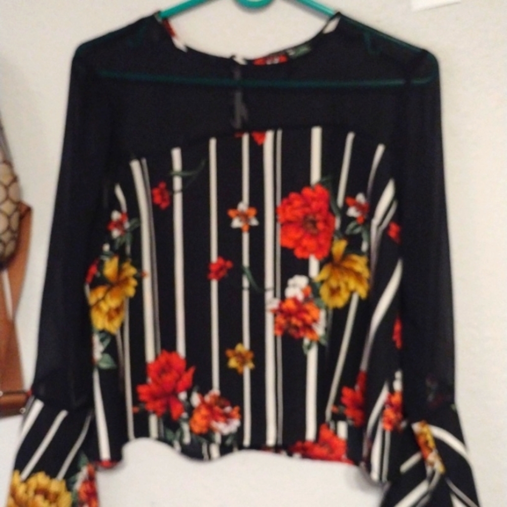 Black with white stripes and some flowers  S